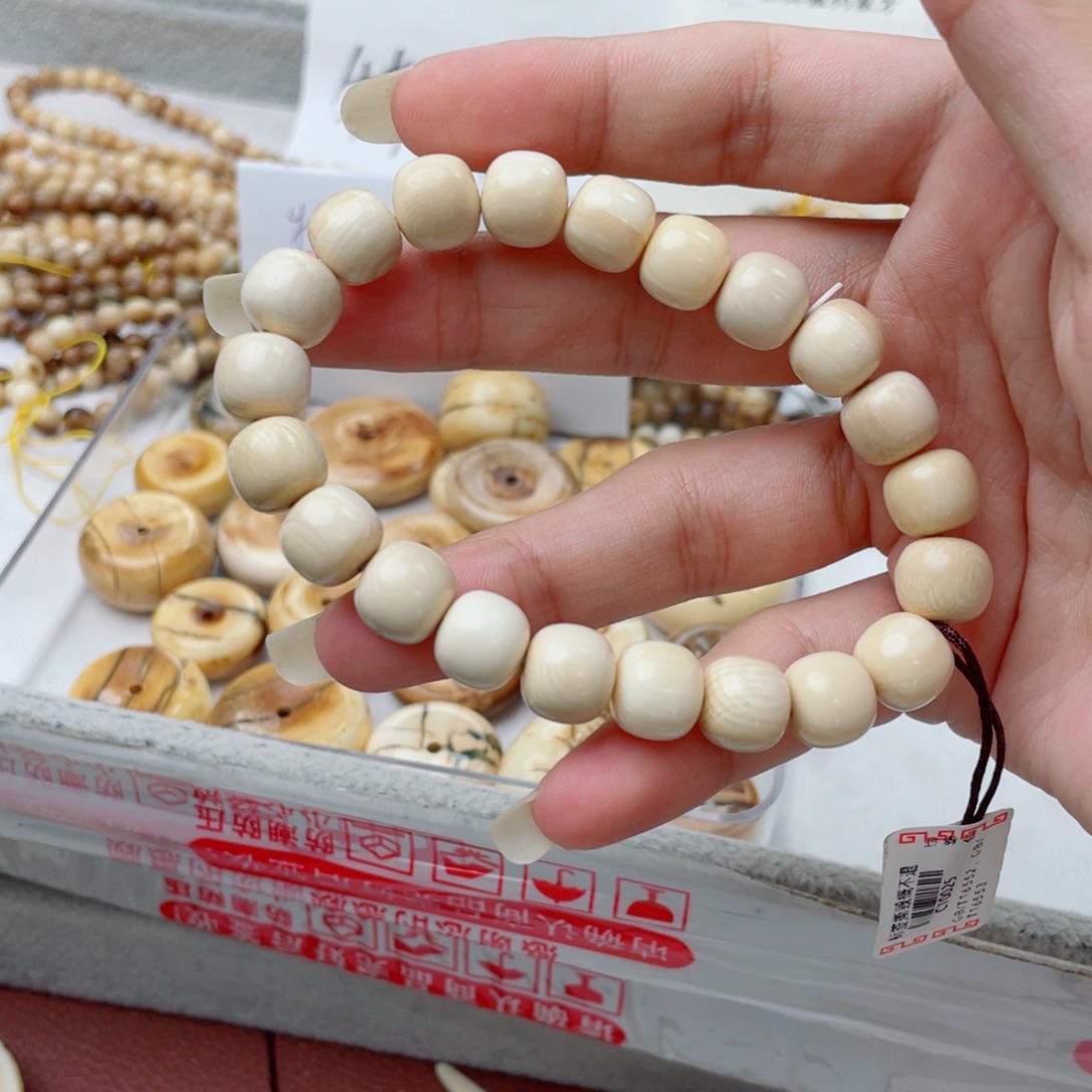 吊坠柏香籽/百香籽猛犸牙老型珠手串