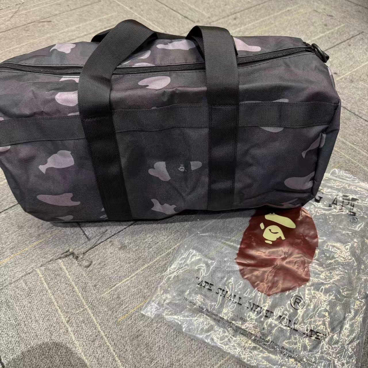 猿人头 （杂志附录包）黑色迷彩桶包  潮流周边 2505230203C