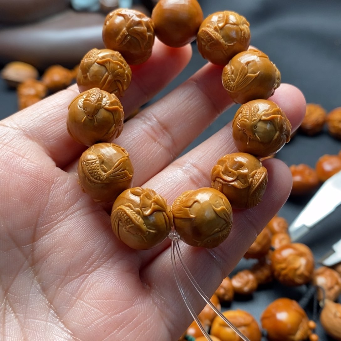 吊坠橄榄核、***哥莲花鱼穿隔片