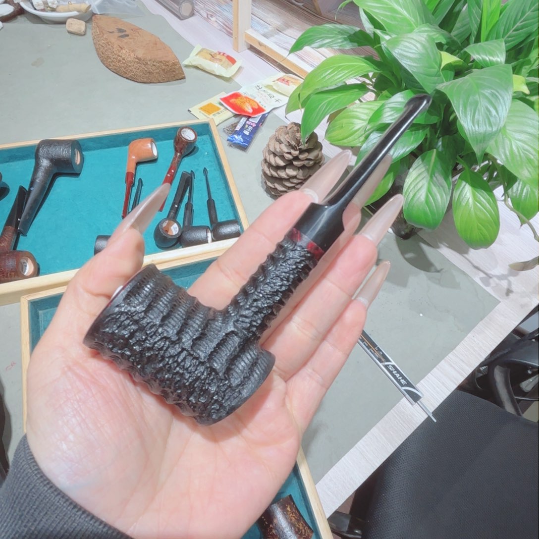 M**王焦耀烟斗一锤子