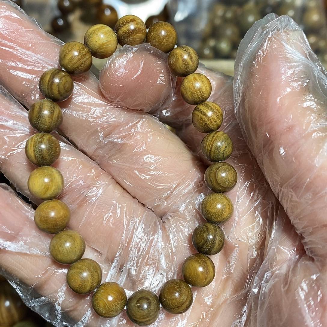 金丝楠左*绿檀0.8手串