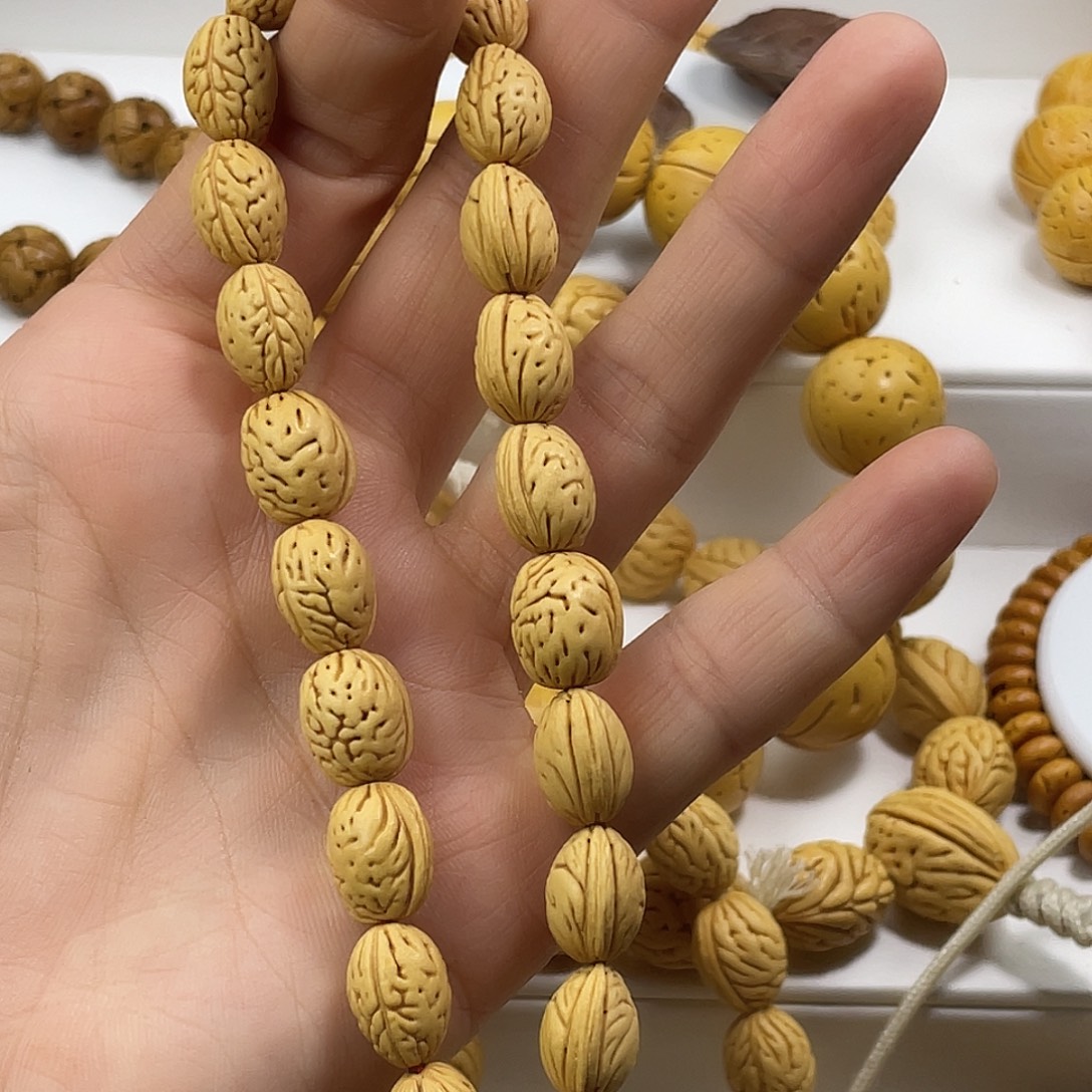 嘻***恼东北脑纹桃核0.9钱袋子