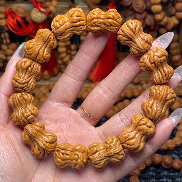 雄***哥木质类龙纹桃枭手串