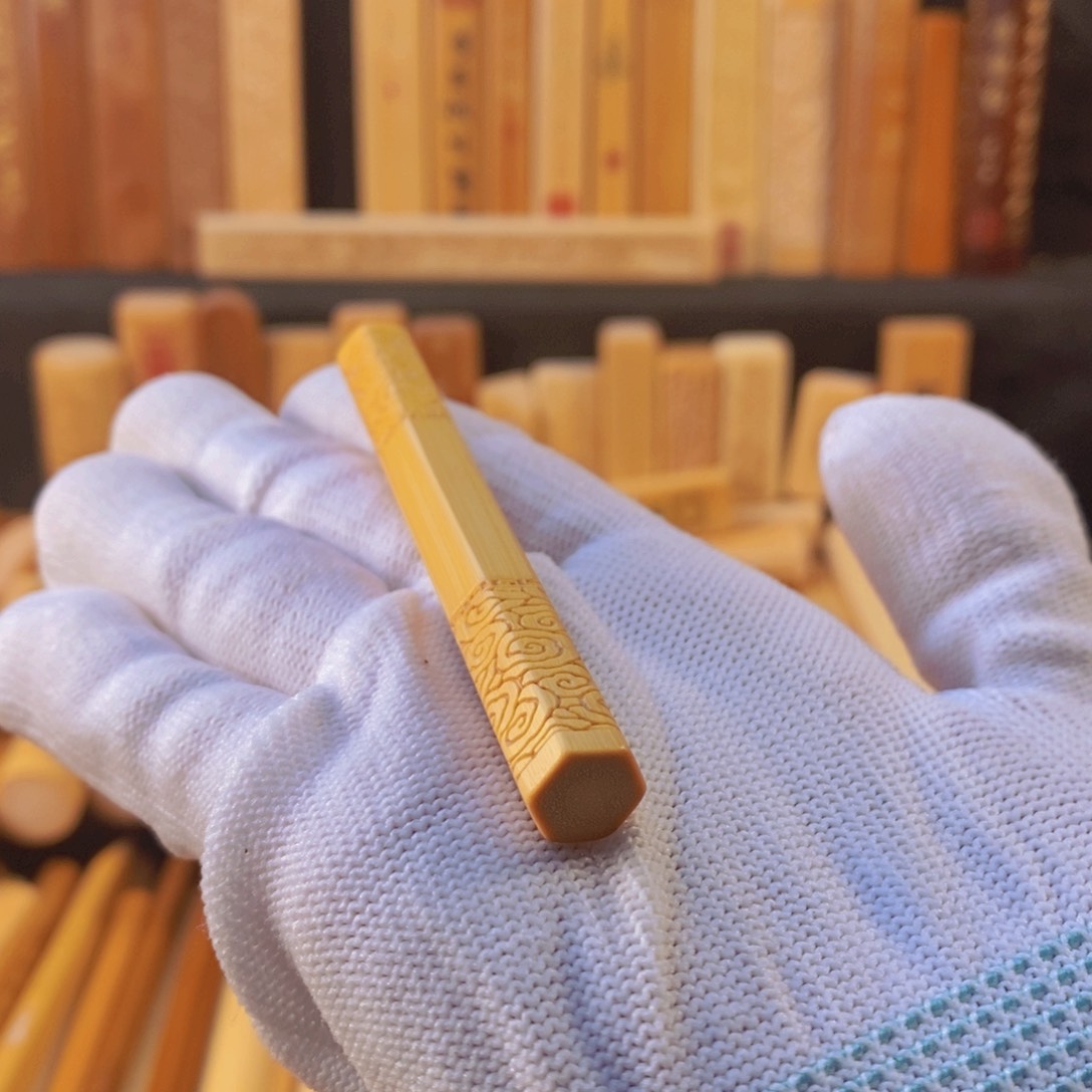 竹黄皮手把件六角橙皮雕刻