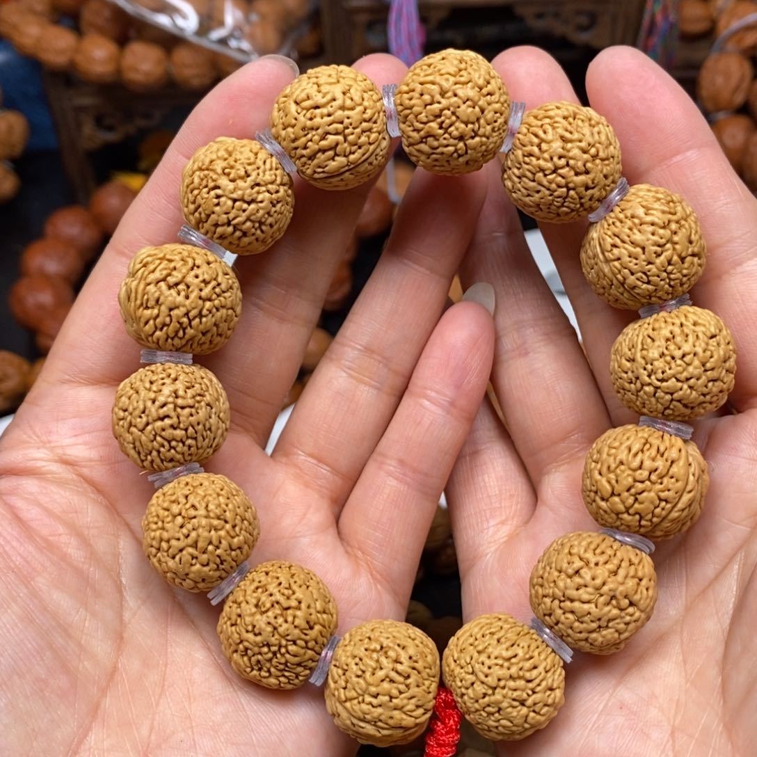 桃核手串龙鳞凤尾