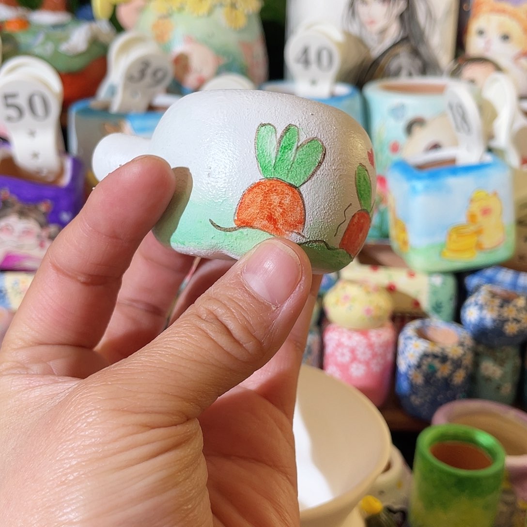 红陶手工….收好小兔子