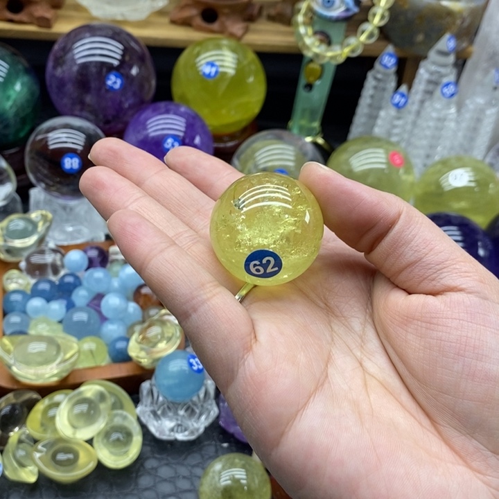 1***3石材天然黄水晶球