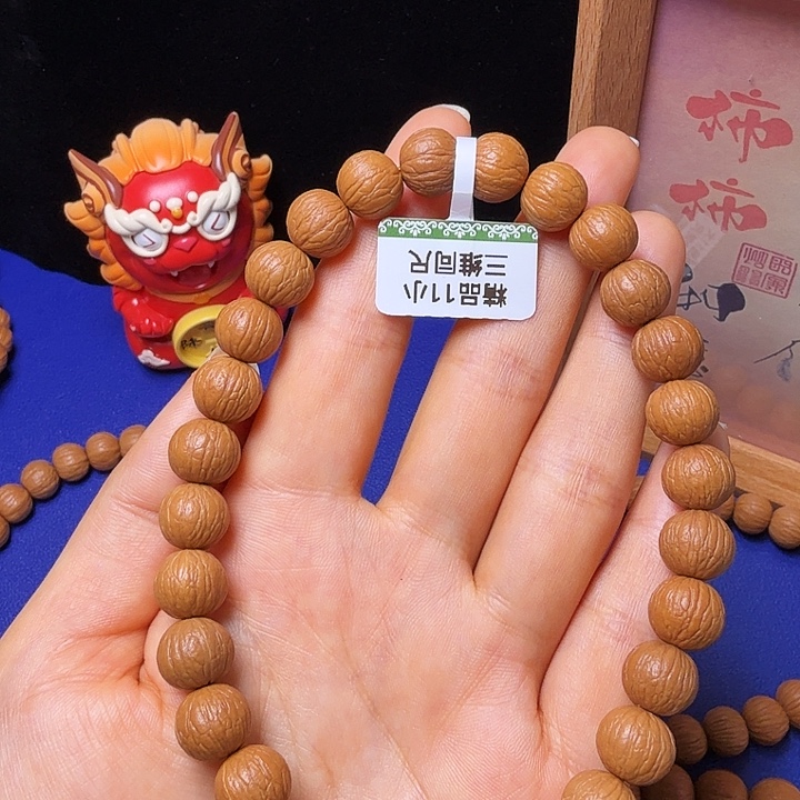 人***何猴头核桃吊坠凤羽