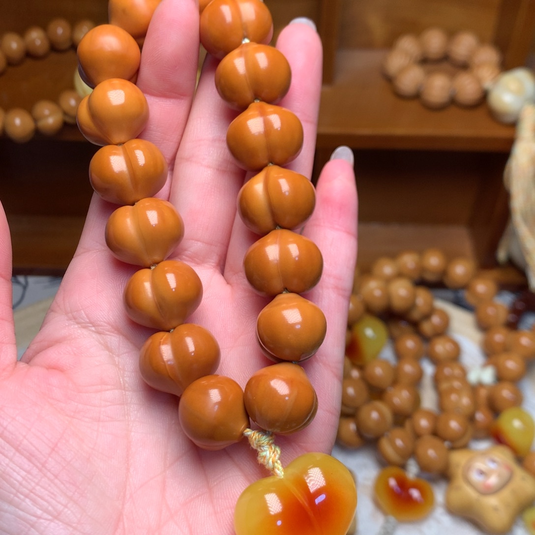 猴头核桃把件17玻璃底屁桃手持爱心