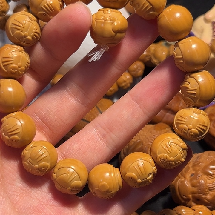 橄榄核手串/手链猴头哆啦A梦三通