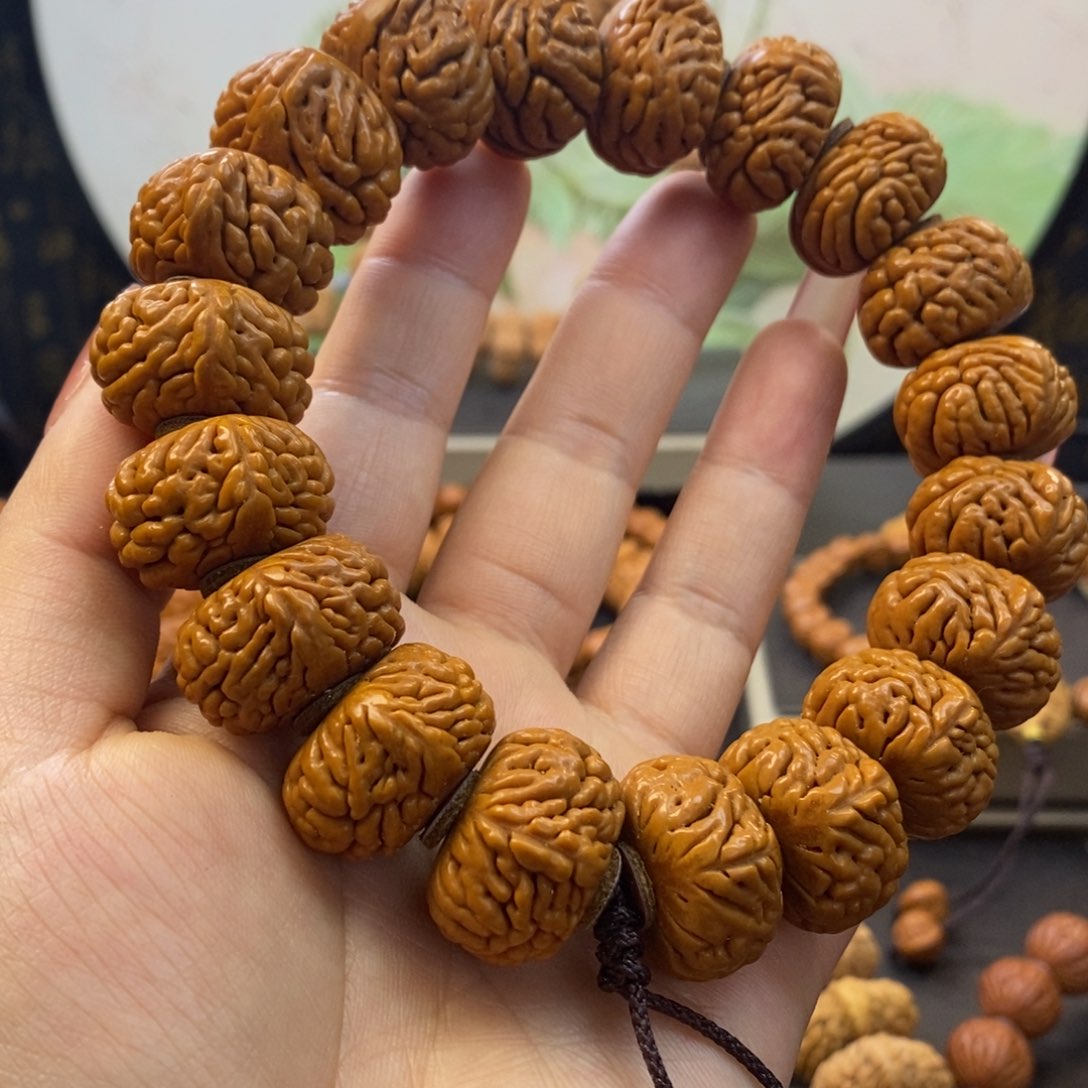 桃核手串龙纹桃核麒麟