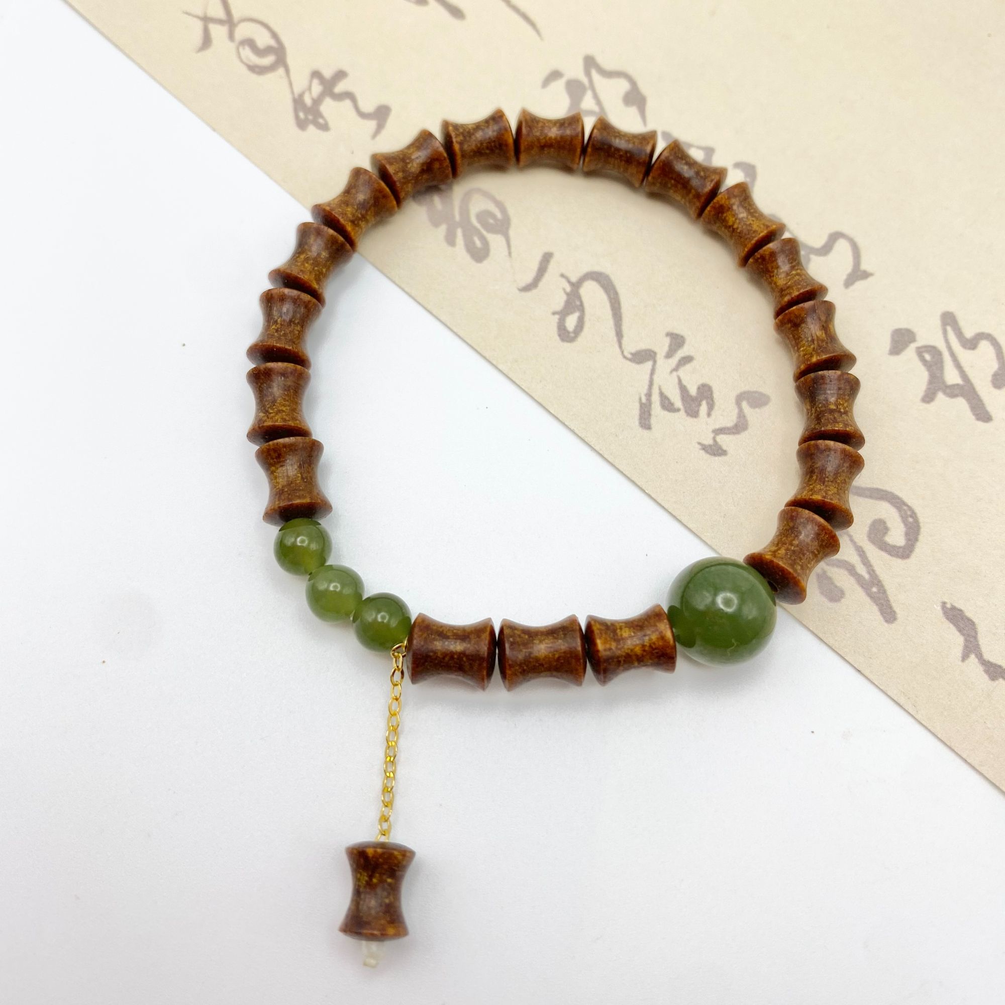 巴布亚贡木6×8mm竹节单圈手串