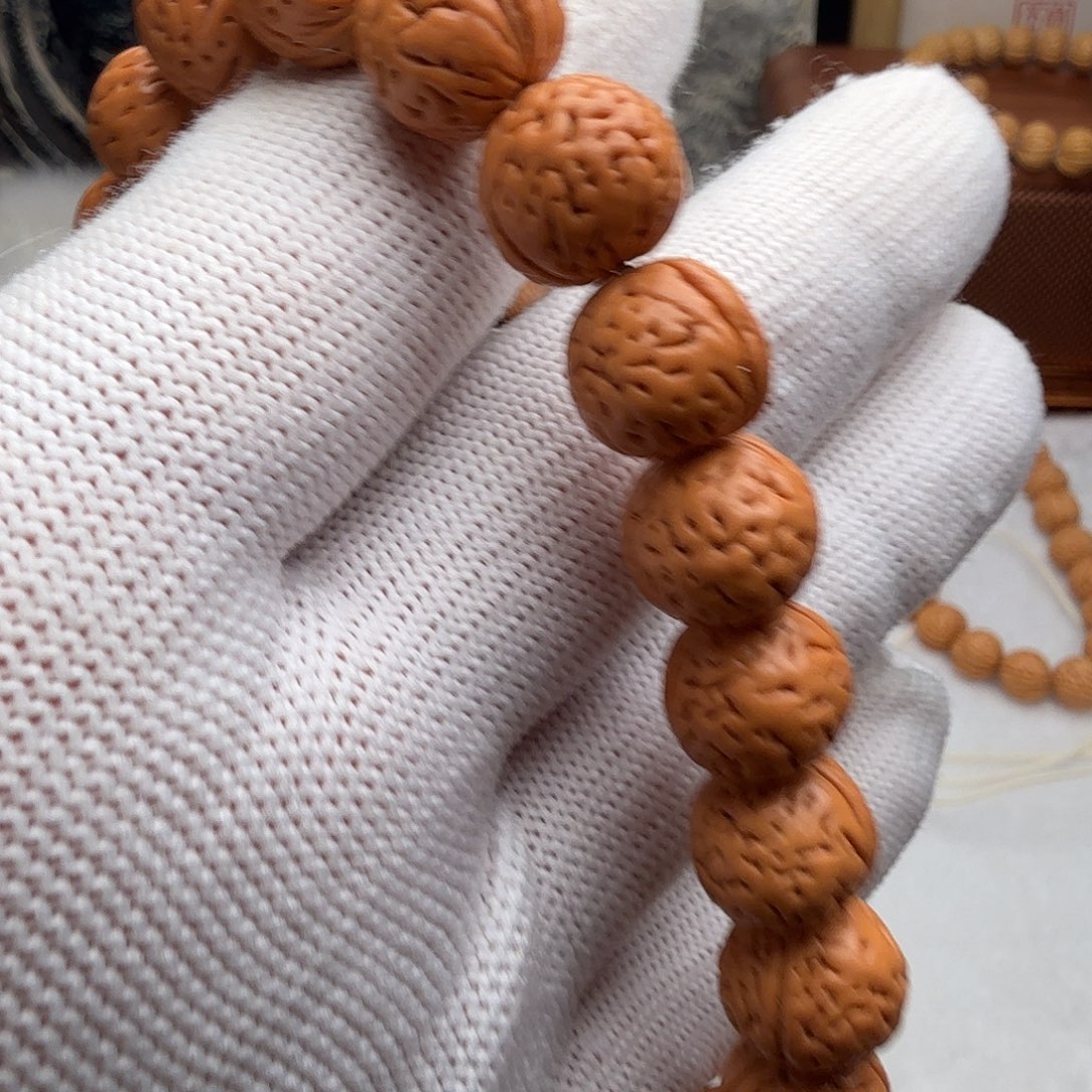 哈***哈桃核吊坠桃核手串