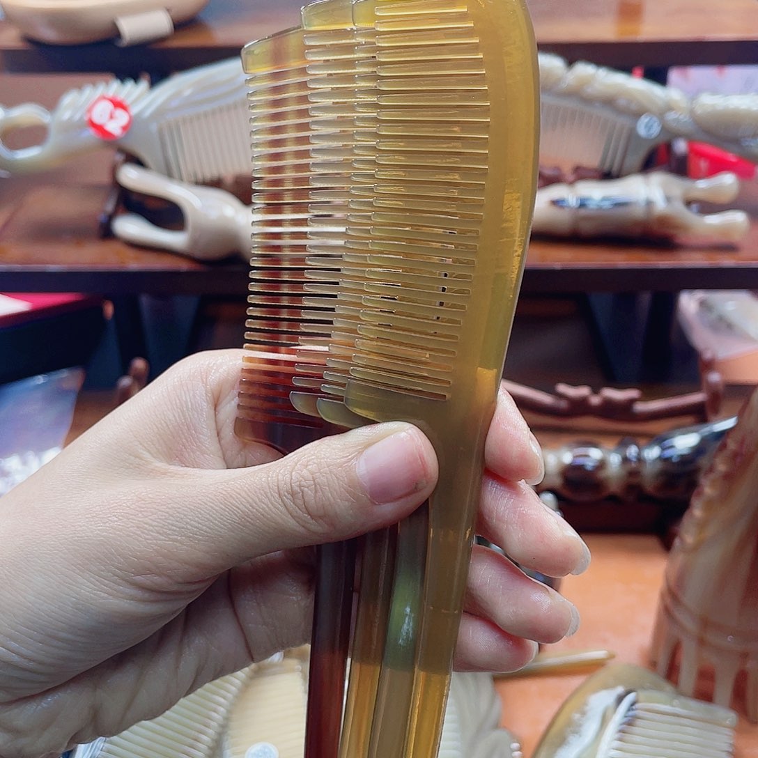 纯手工制作牛角梳挑发