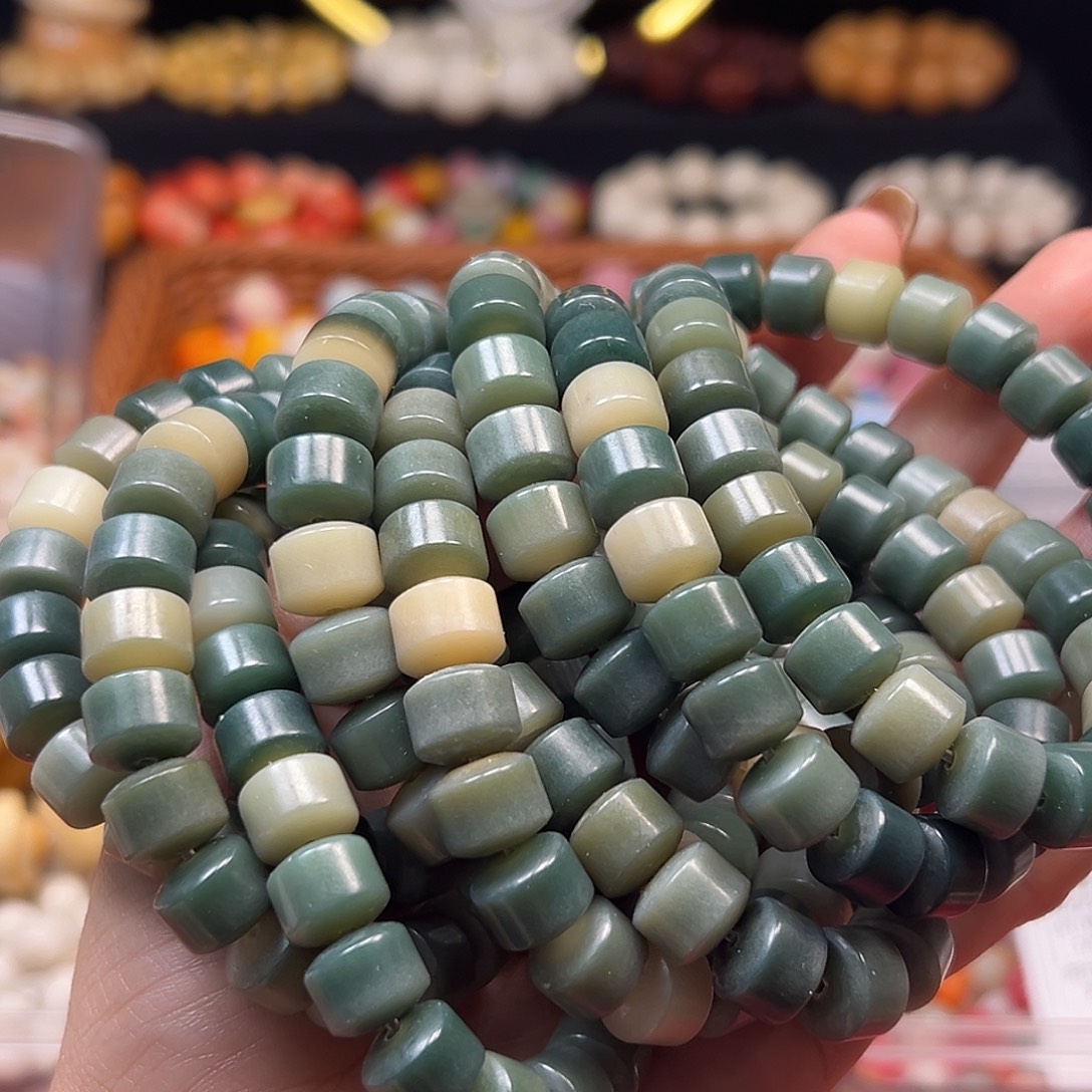 手串菩提根/象牙果变色金轮10条