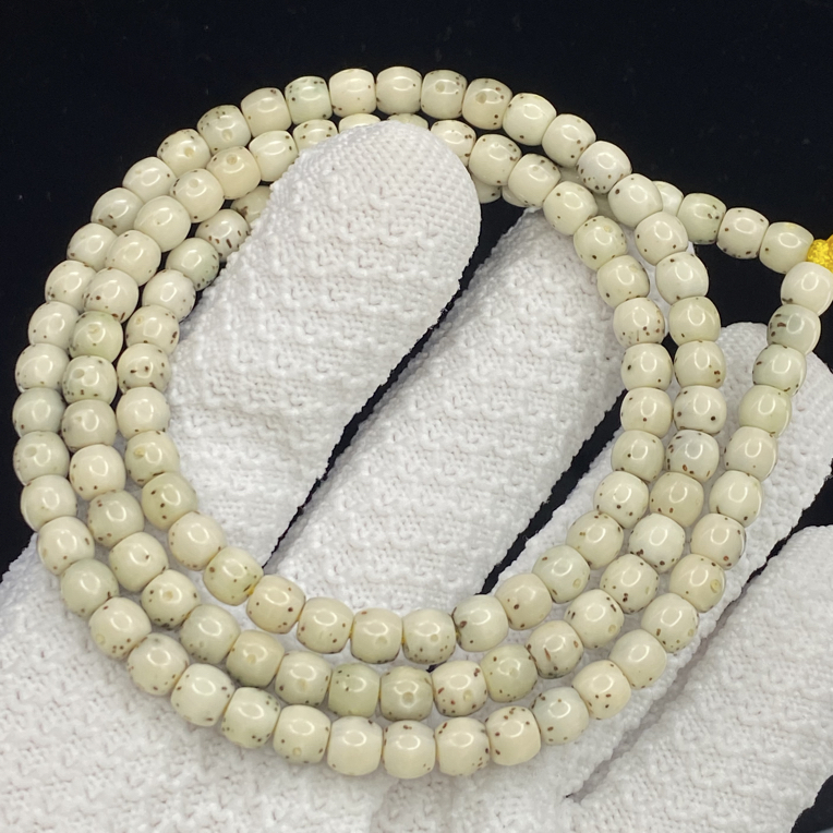 星月菩提海南原生态石玉料鼓珠大留白6*5长串