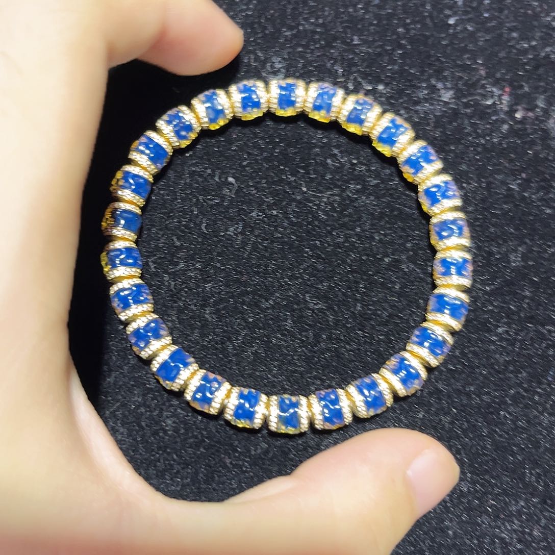 T***6蓝珀银S925镀金镶嵌珠宝奇石7mm多米无相手持