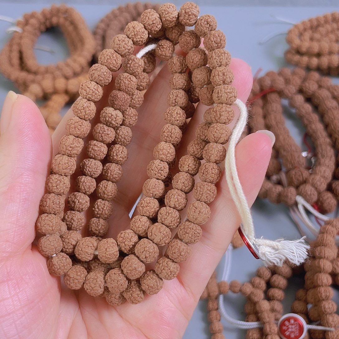 俊***℡金刚菩提吊坠闷镦龙108