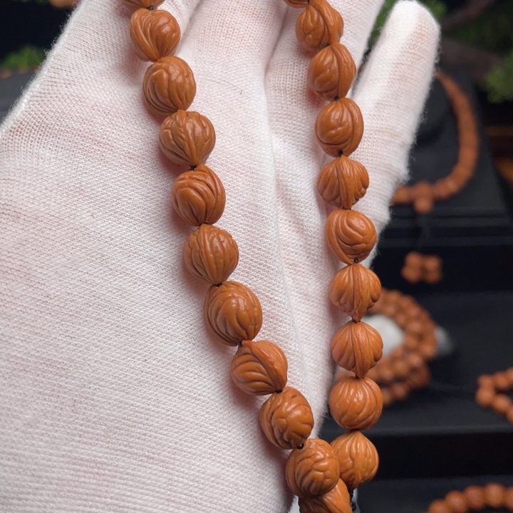 子***昱木质类精品桃核手持