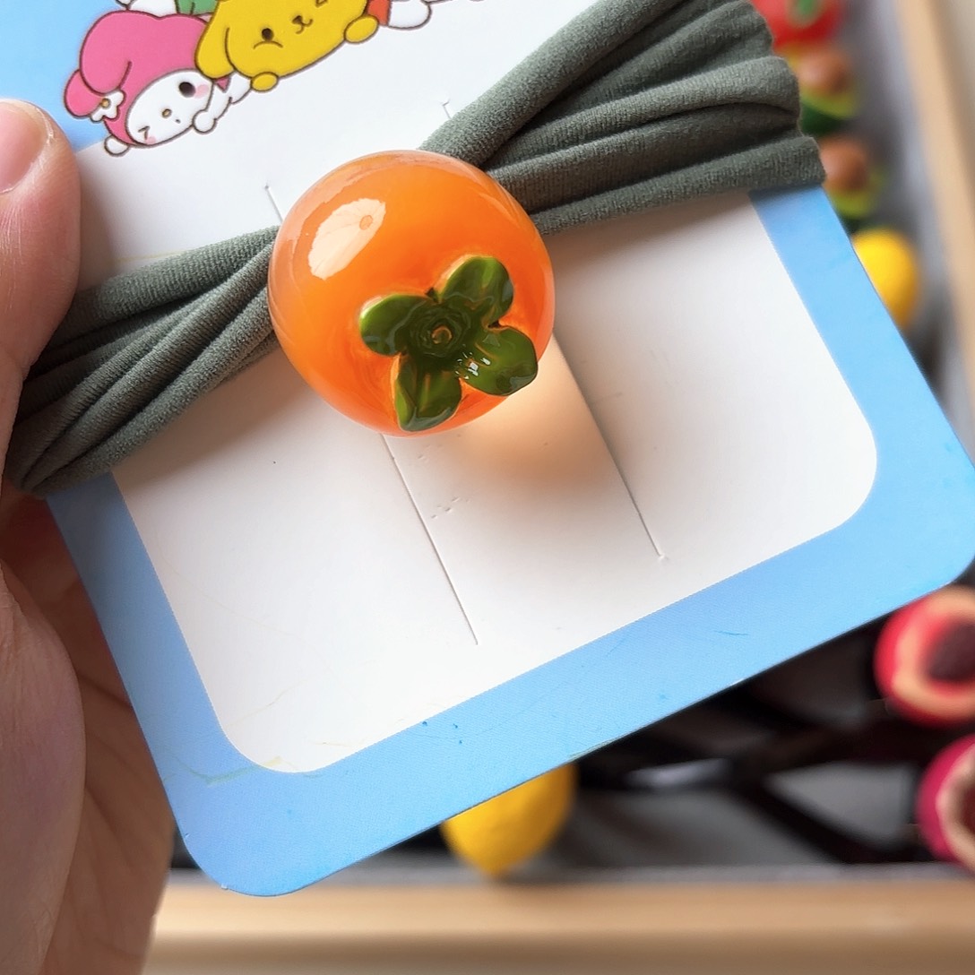 布艺铁合金夜光柿子发圈