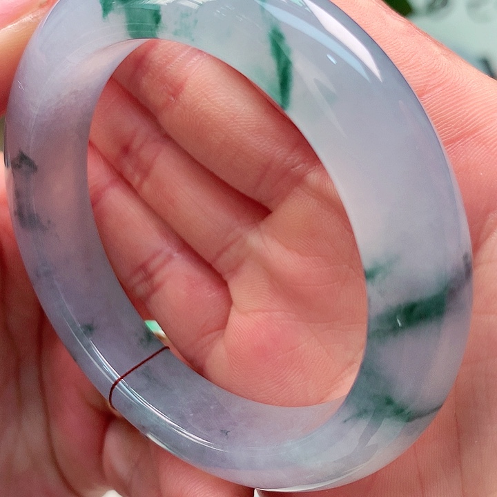 某***李翡翠未镶嵌手镯付定金20000元未付尾款48000