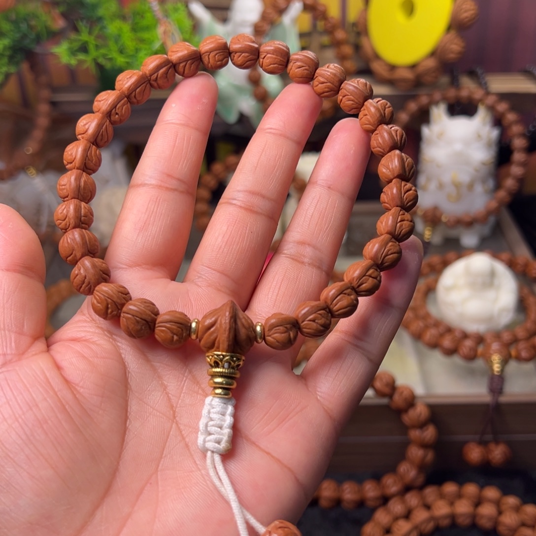 2***7吊坠桃核玉龙脊10，54颗