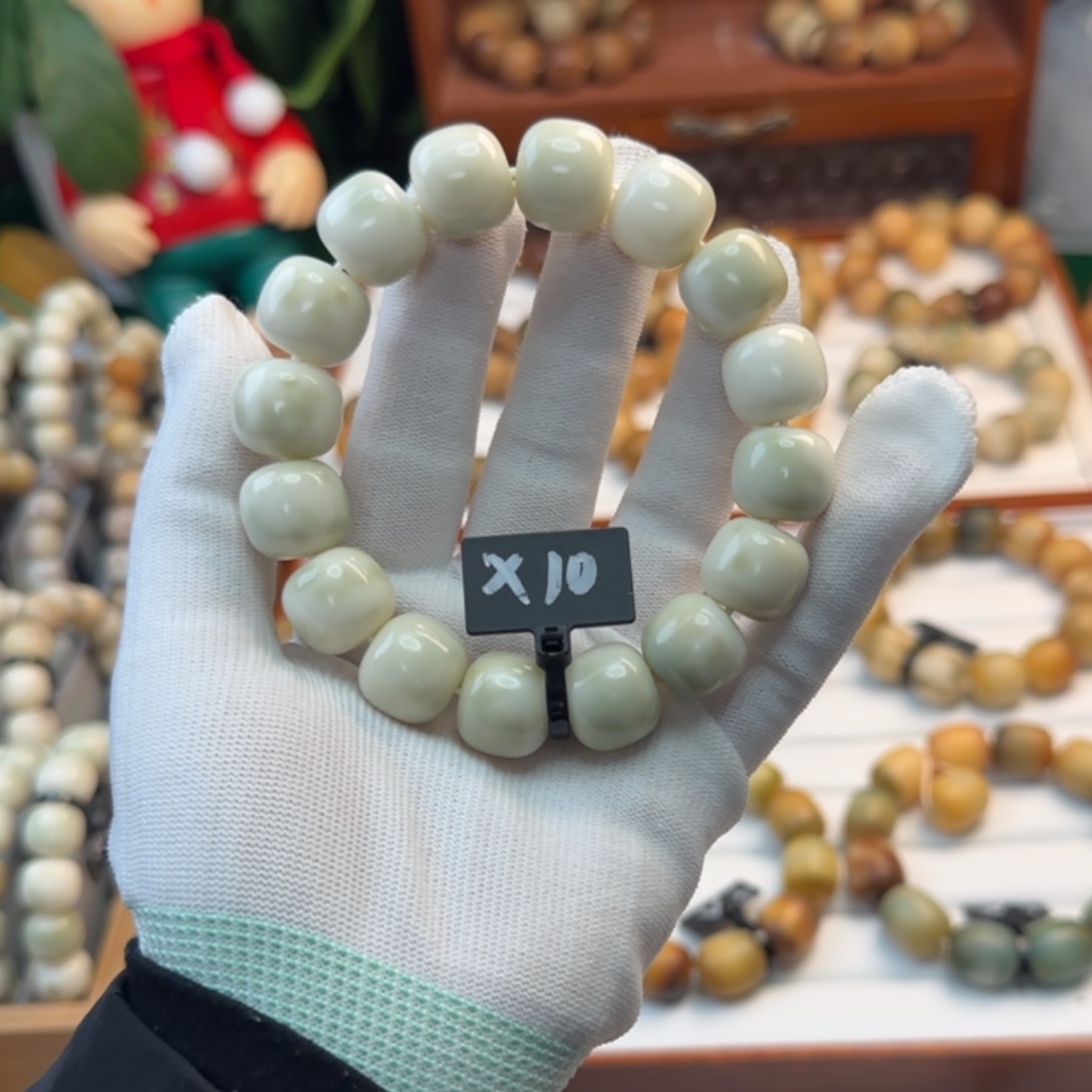 菩提根/象牙果手串卡16桶珠奶绿瑕疵10