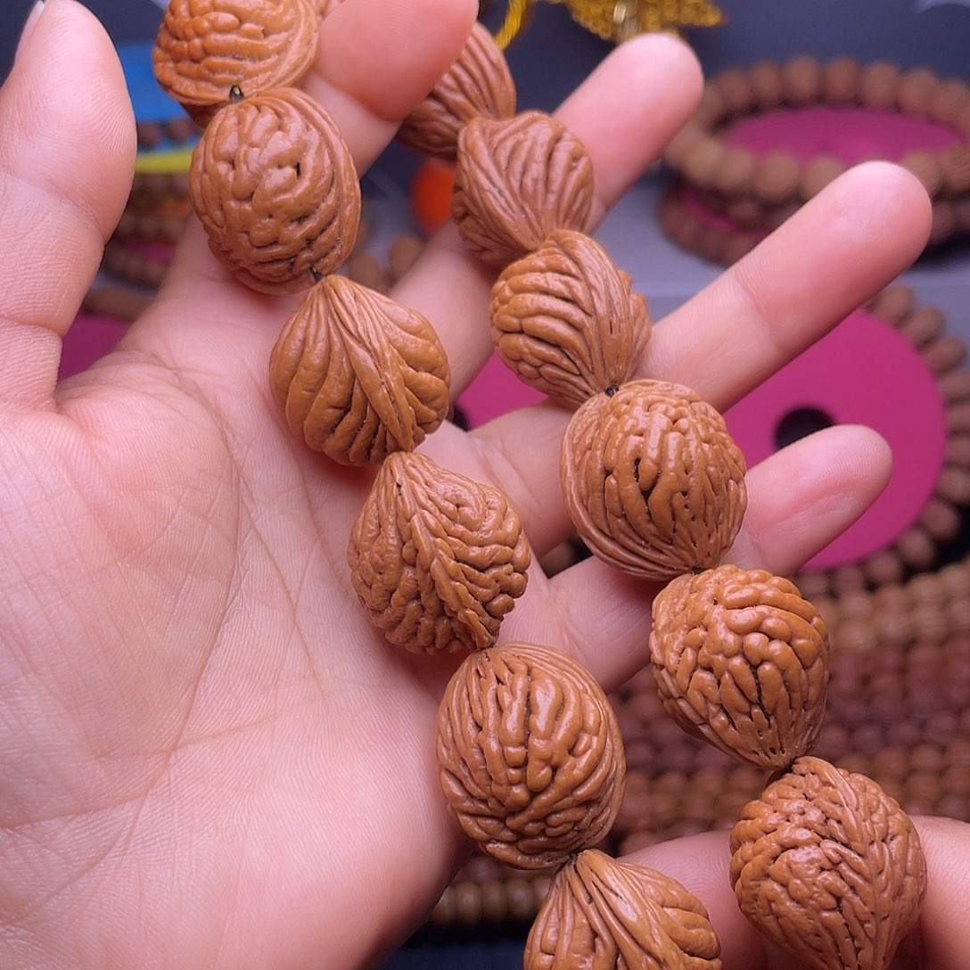 L***:吊坠桃核秦岭桃枭手持15颗籽