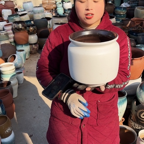 口21高22瑕疵盆子。