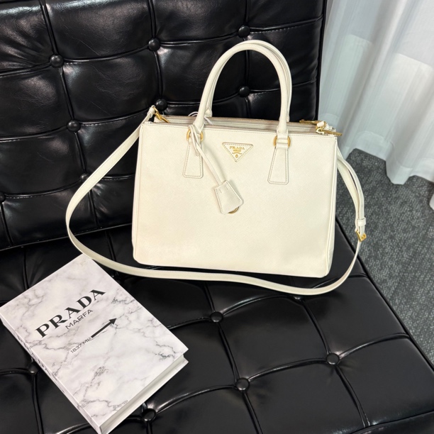 95新 Prada/普拉达 新款白金十字纹杀手斜挎包 cy