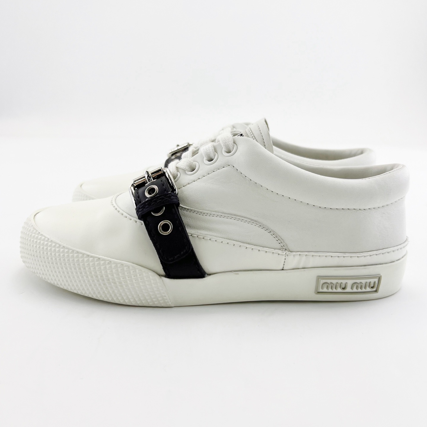 95新 MIU MIU/缪缪 36码/白色真皮塔扣低帮系带板鞋/16102486