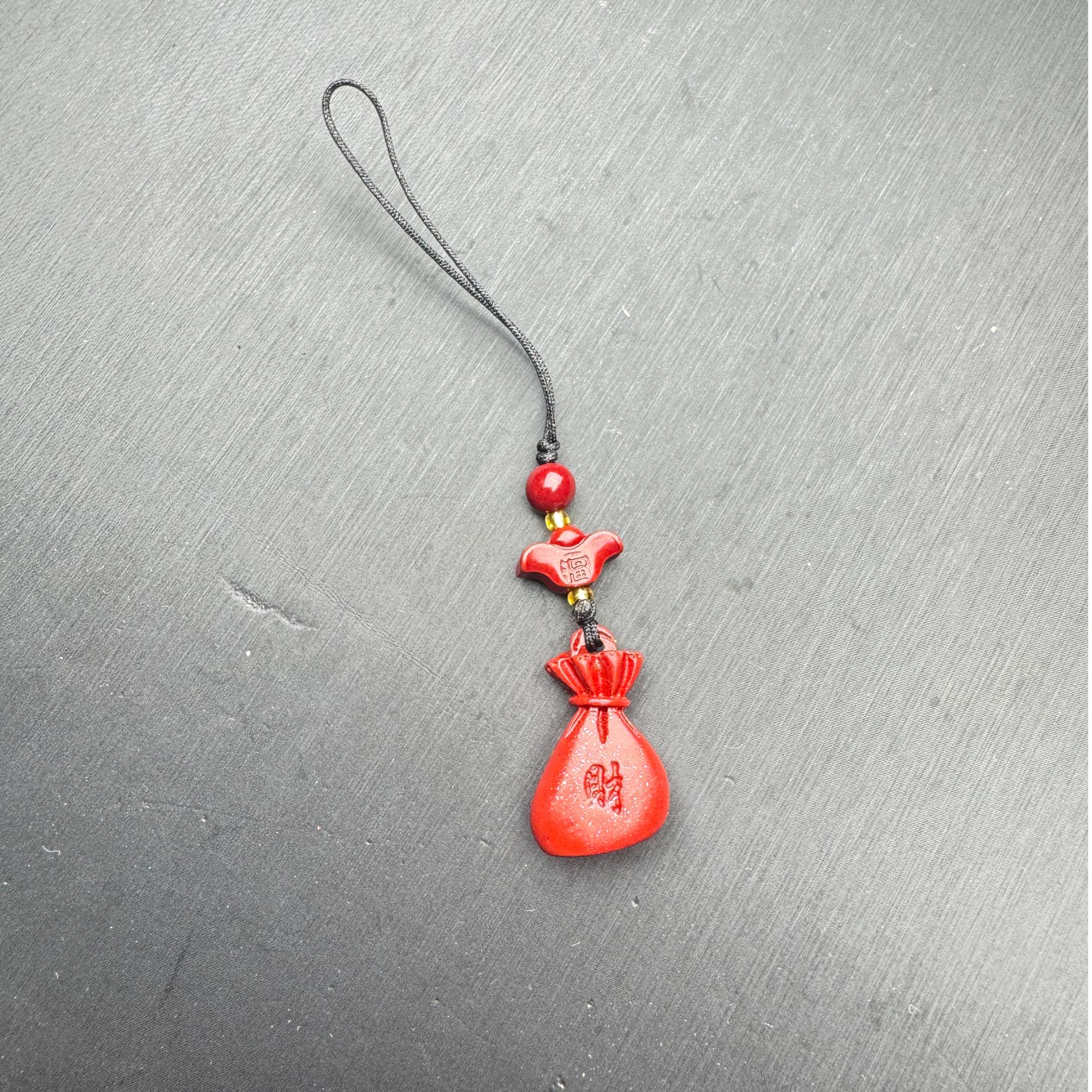 含辰砂工艺品ZBG1026辰砂钱袋子挂坠（天然珠宝多样性发其一）
