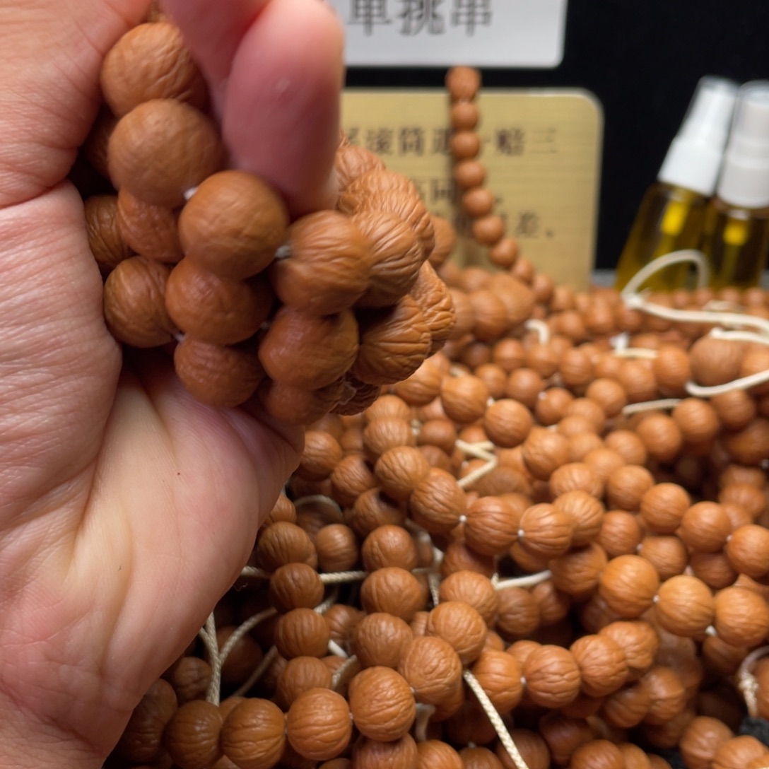 吊坠猴头核桃凤羽