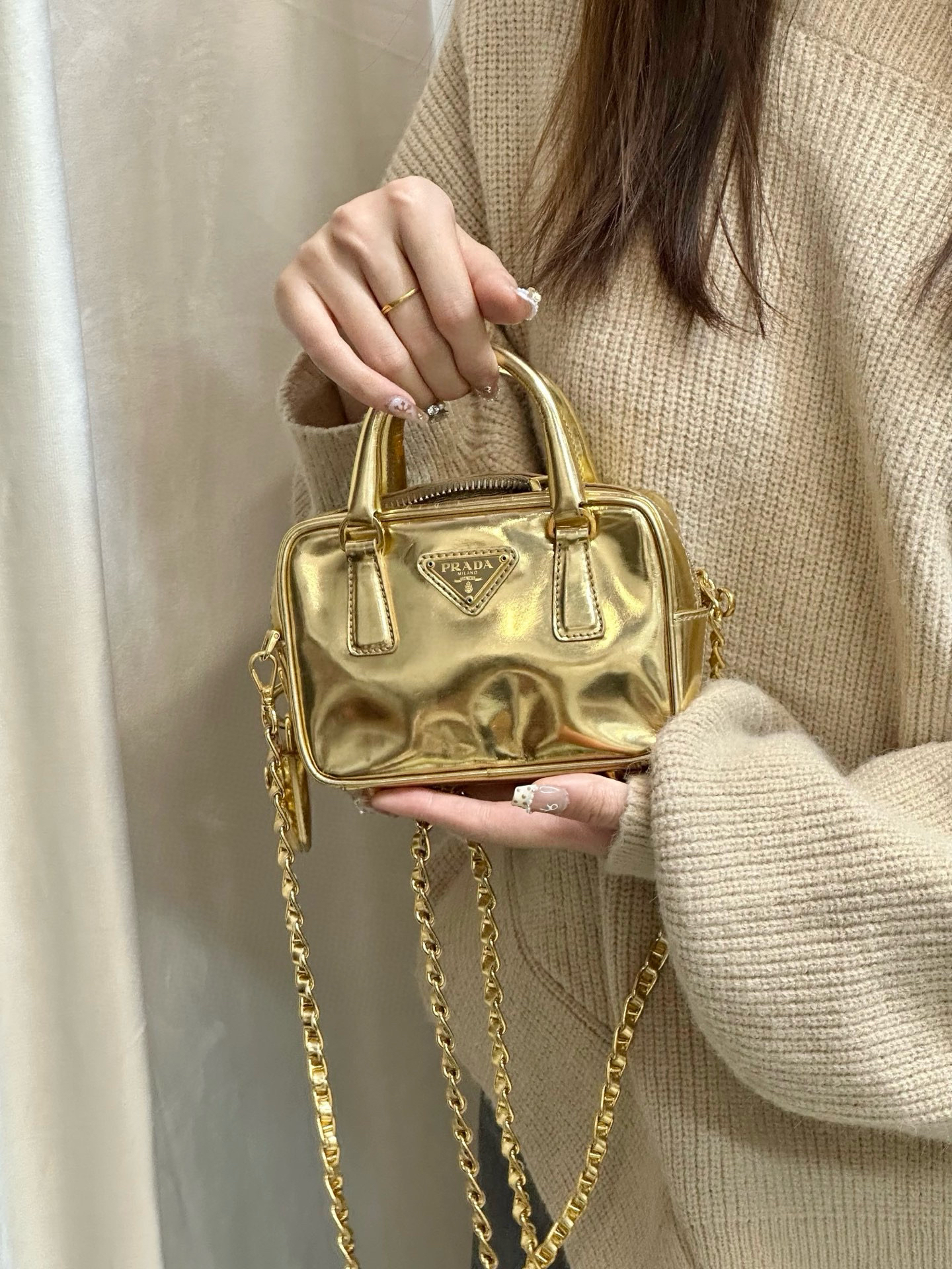 95新 Prada/普拉达 prada金色小号斜挎包 