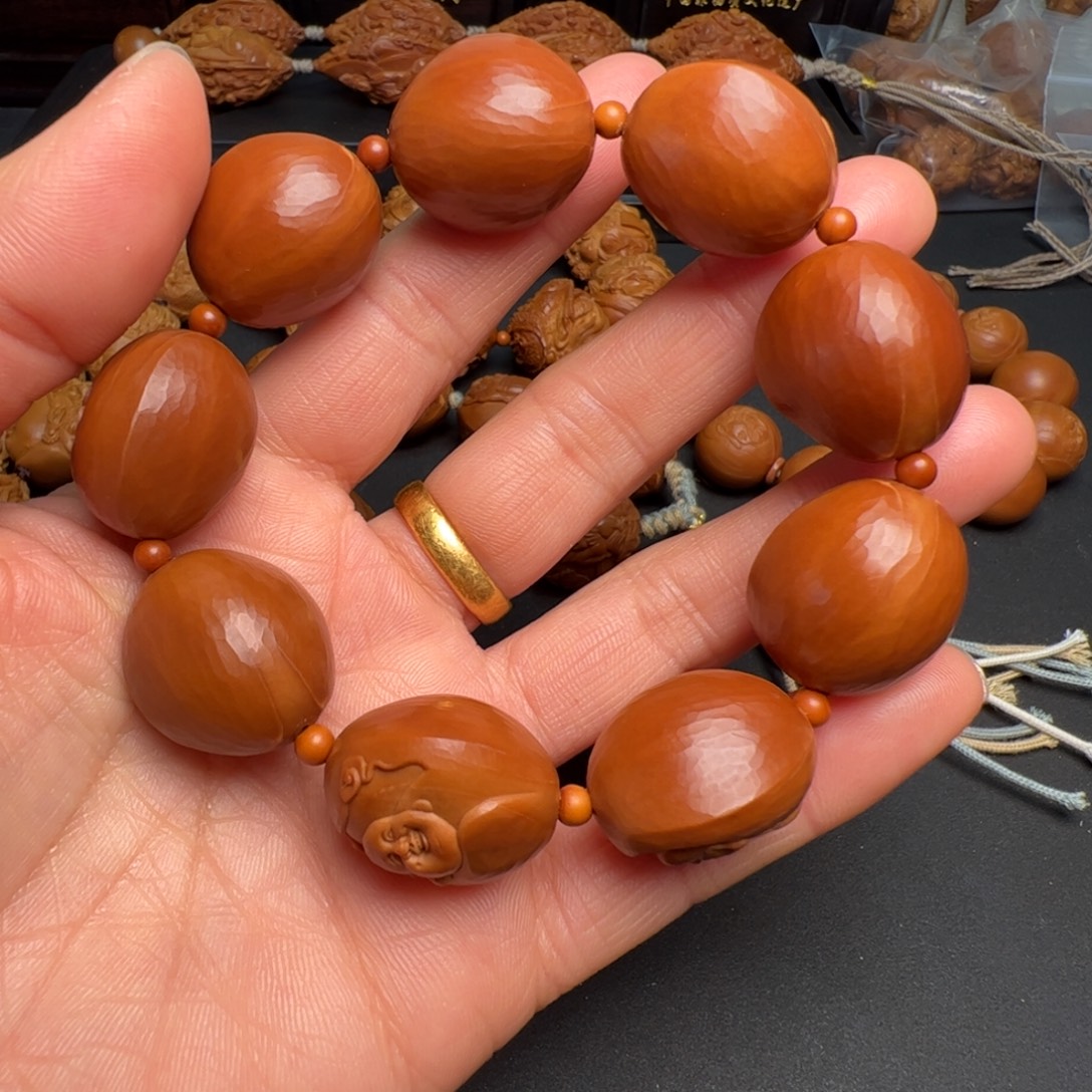 阳***花橄榄核手串/手链橄榄核雕刻的核雕作品