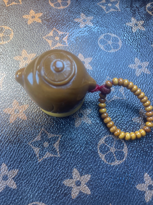 大橄榄雕刻把把壶