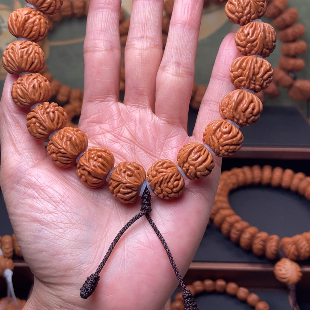 桃核手串17聚宝盆
