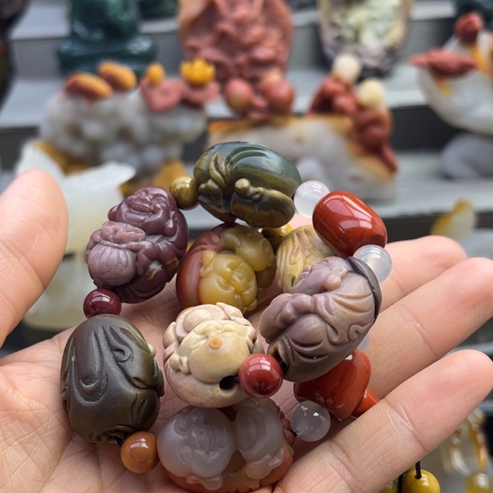 晨***妈石英质玉手把件未镶嵌