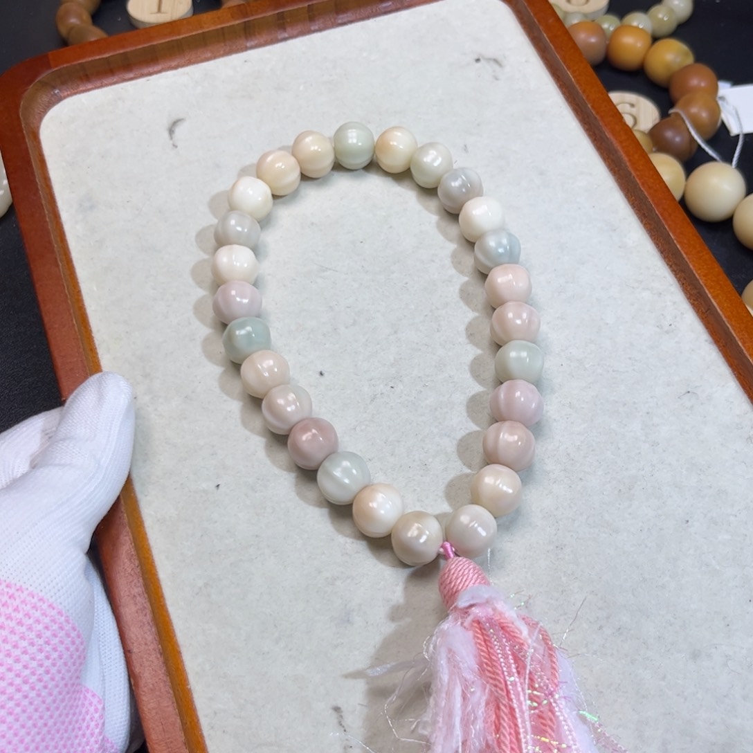 菩提根/象牙果吊坠仙女手持