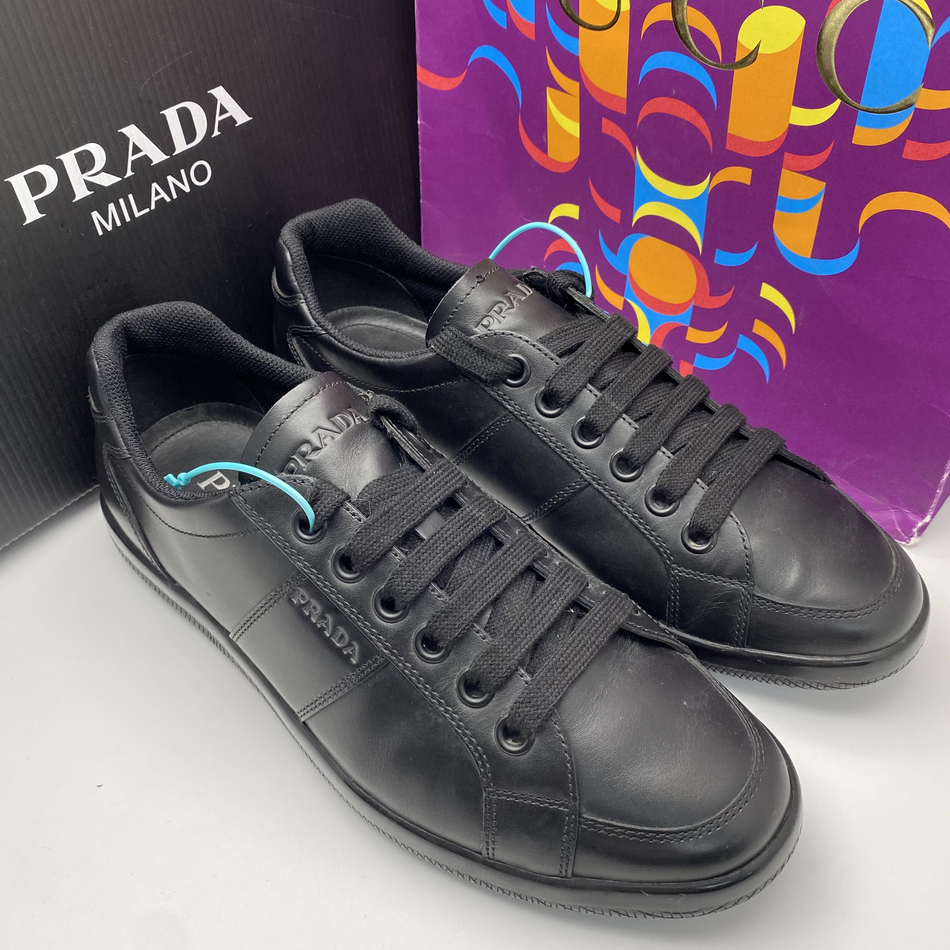 95新 Prada/普拉达 40.5欧码/黑色皮质侧边印花logo舒适休闲板鞋