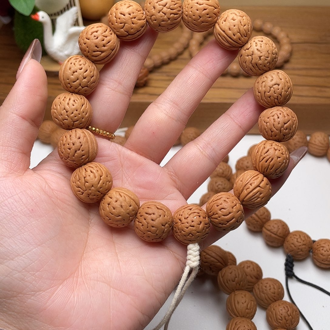 用***916加野生灯笼桃核手持