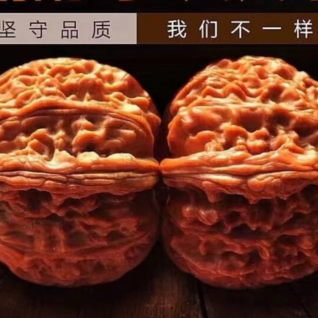 苹果圆四座楼狮子头文玩核桃精品闷尖麒麟纹官帽手把件