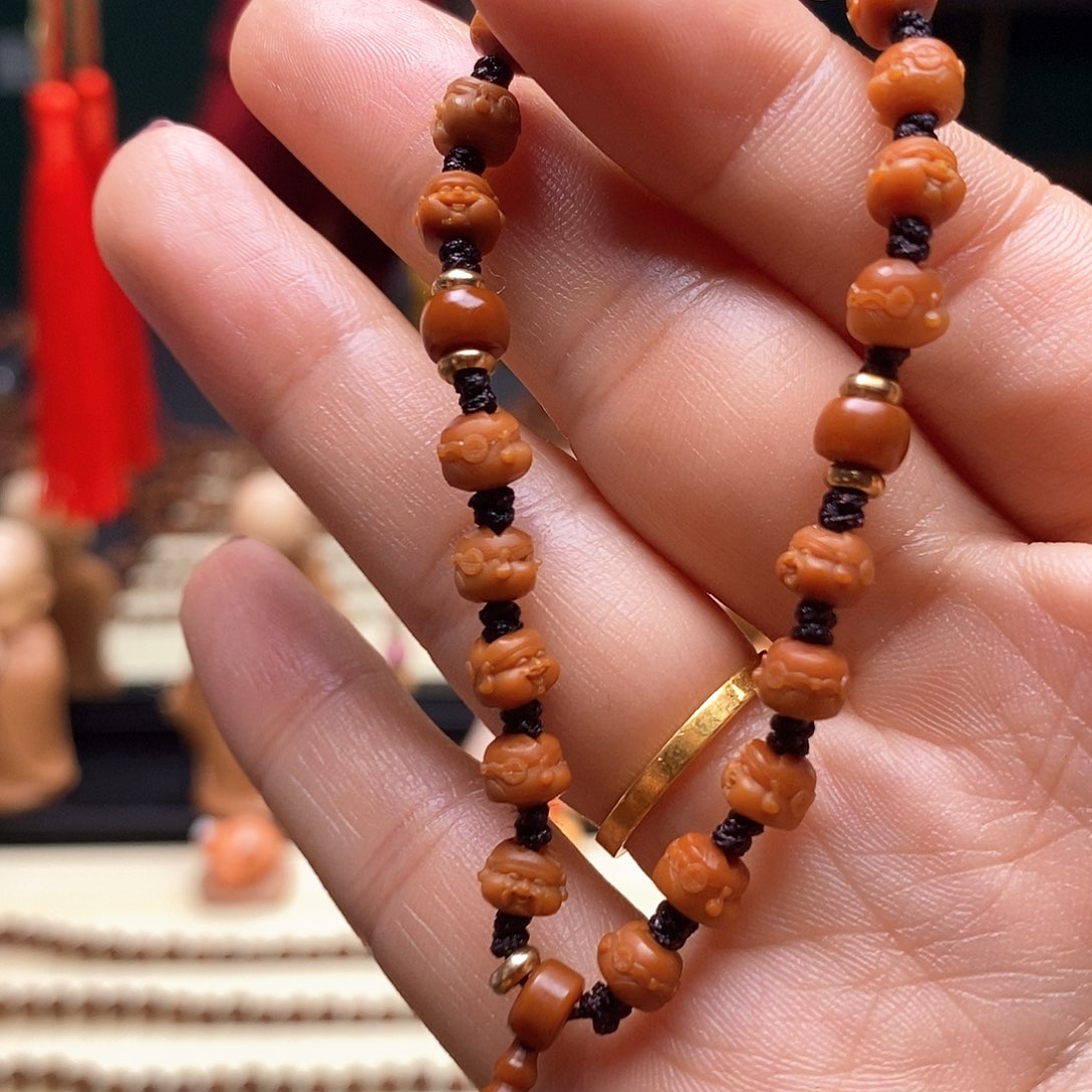 吊坠橄榄核0.6十八财神手串