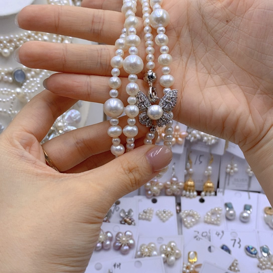 银S925镶嵌淡水珍珠胸饰把****你