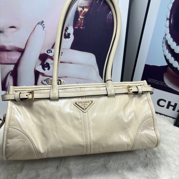 99新 Prada/普拉达 米色softlux斜挎包手提包