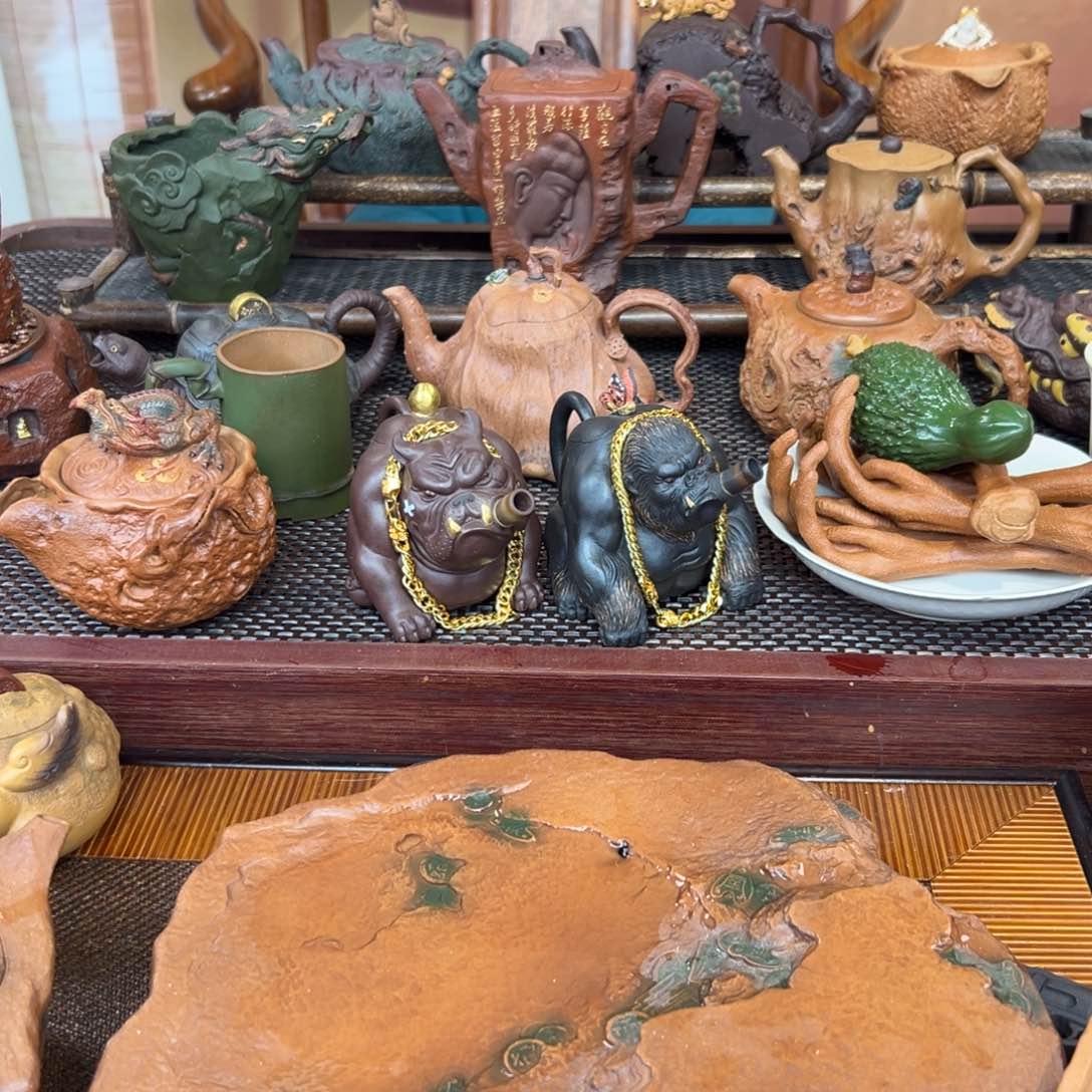 紫砂茶杯小*点石成金车你坎坎坷坷