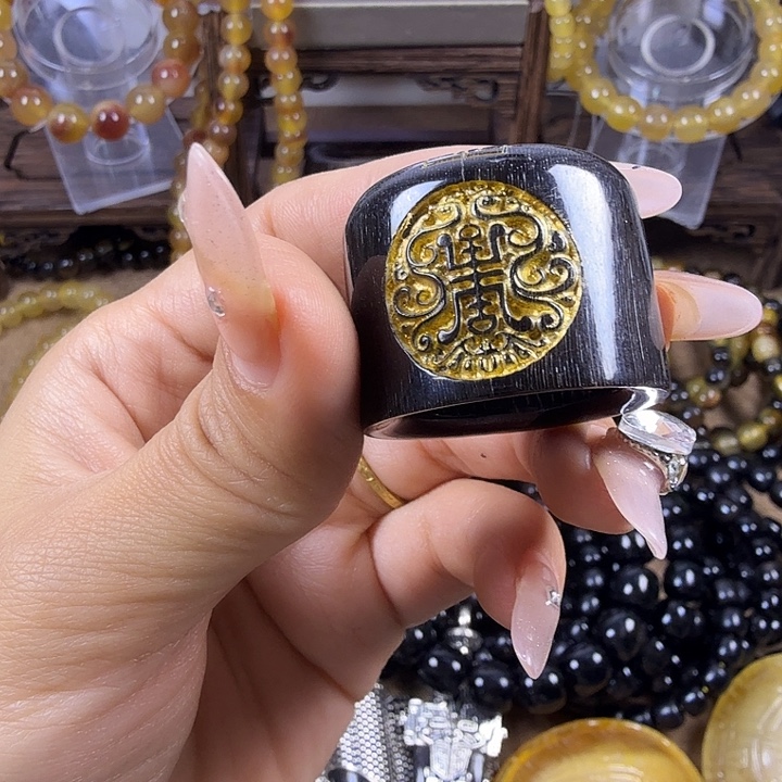 慎***獨木质非金属扳指跑环