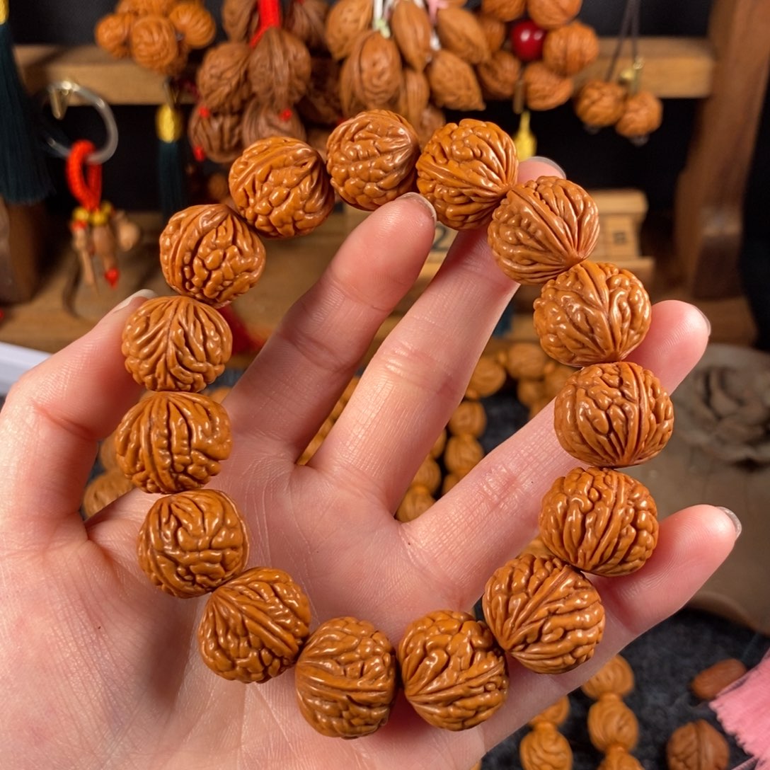 吊坠桃核桃枭手串