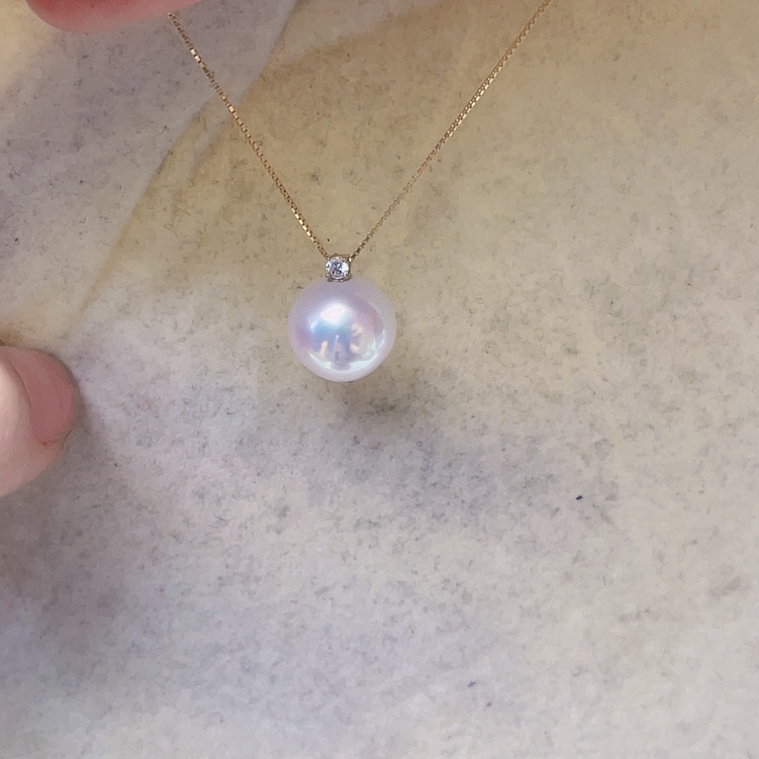 淡水珍珠18K金镶嵌吊坠(赠链)丫**漫