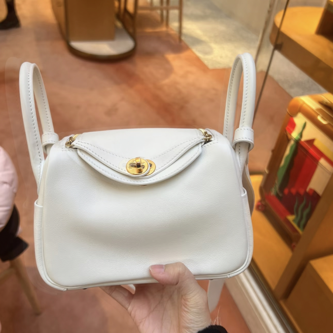 99新 Hermes/爱马仕 爱马仕minilindy纯白金扣tc皮u单肩包8594034